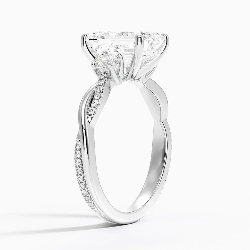 Twisted Band Emerald Cut Three Stone Engagement Ring