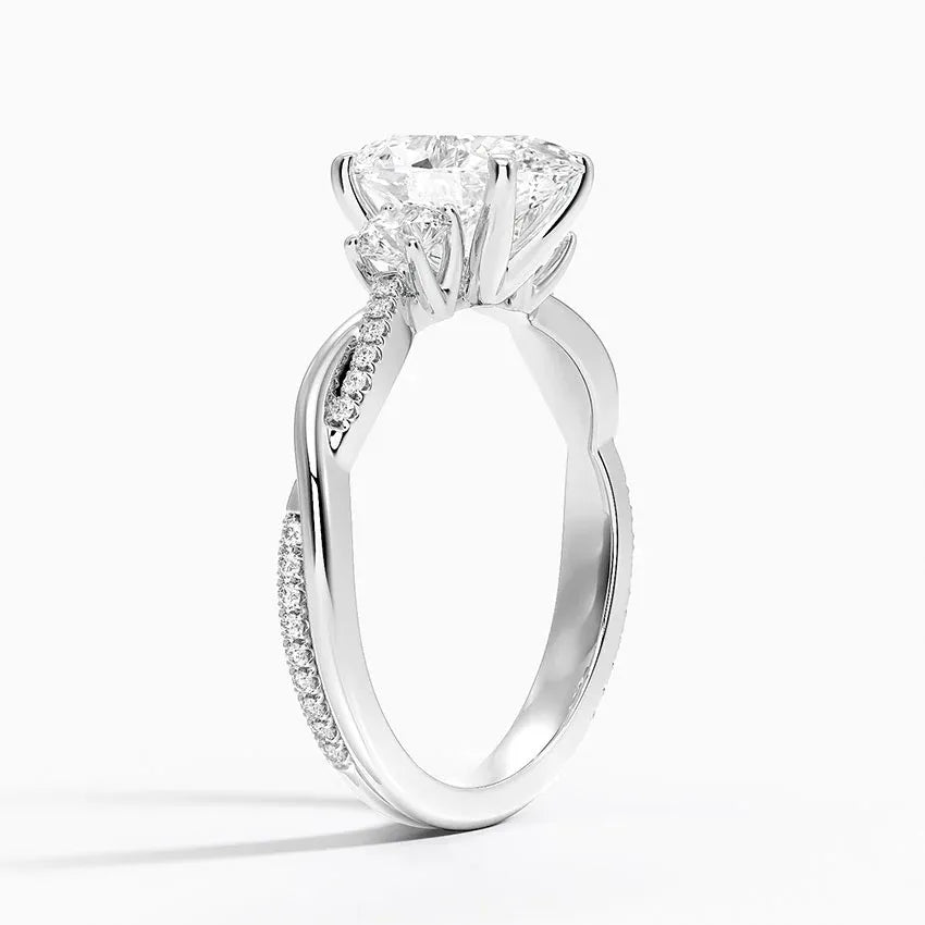 Twisted Band Oval Cut Three Stone Engagement Ring