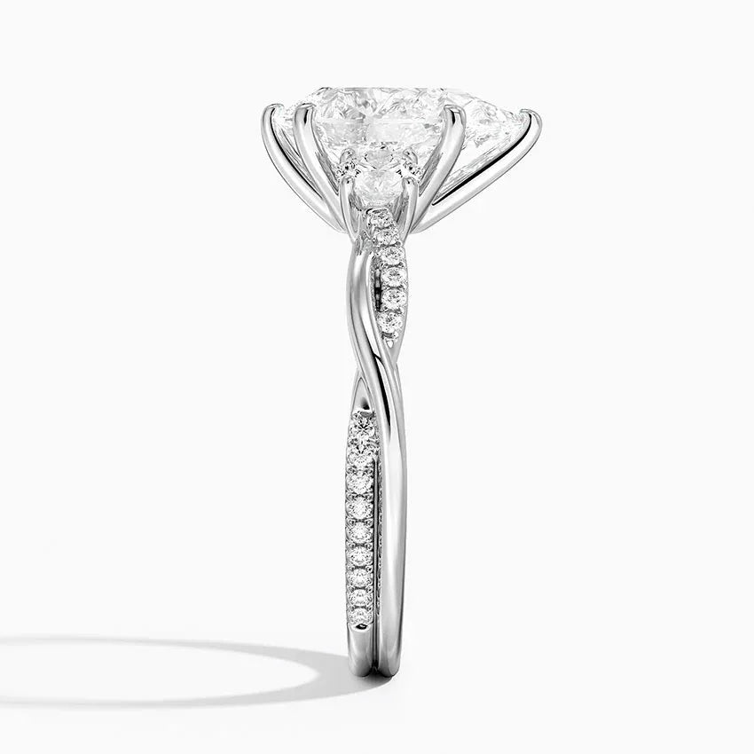 Twisted Band Pear Cut Three Stone Engagement Ring