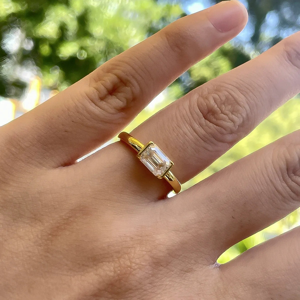 Bezel Set Emerald Cut Moissanite Engagement Ring