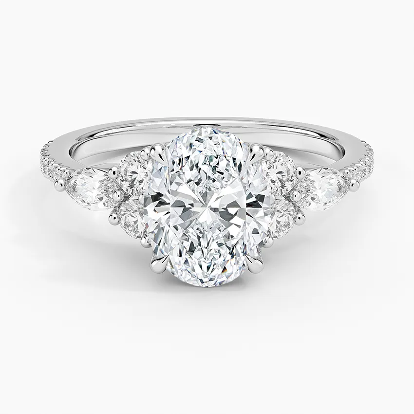 round & pear cluster pave Oval Cut Engagement Ring