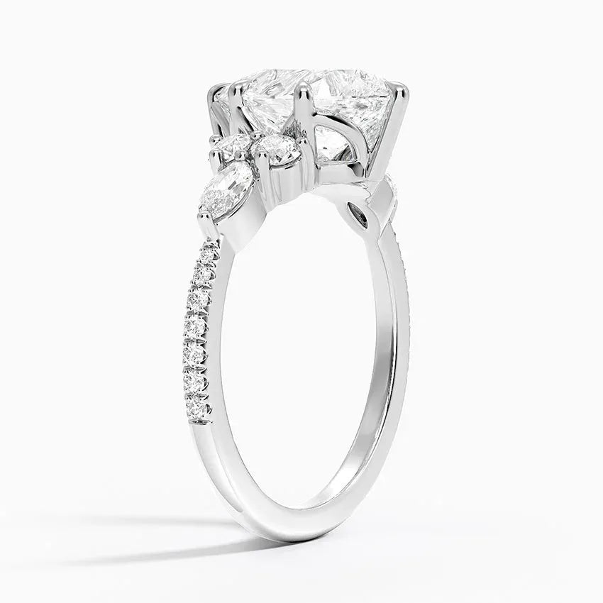 round & pear cluster pave Pear Cut Engagement Ring