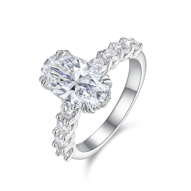 Elongated Oval Side Stone Double Prong Moissanite Engagement Ring